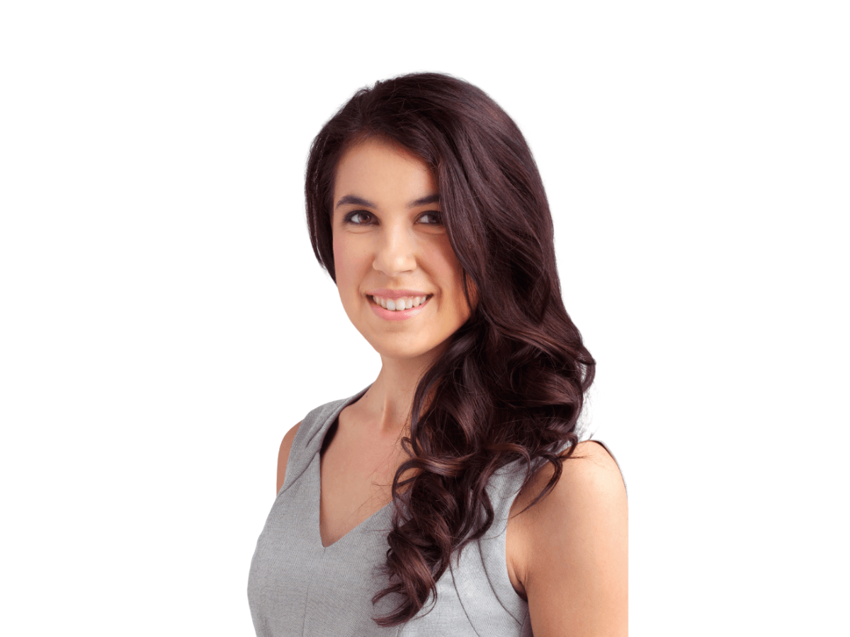 Smiling woman with long dark curled hair