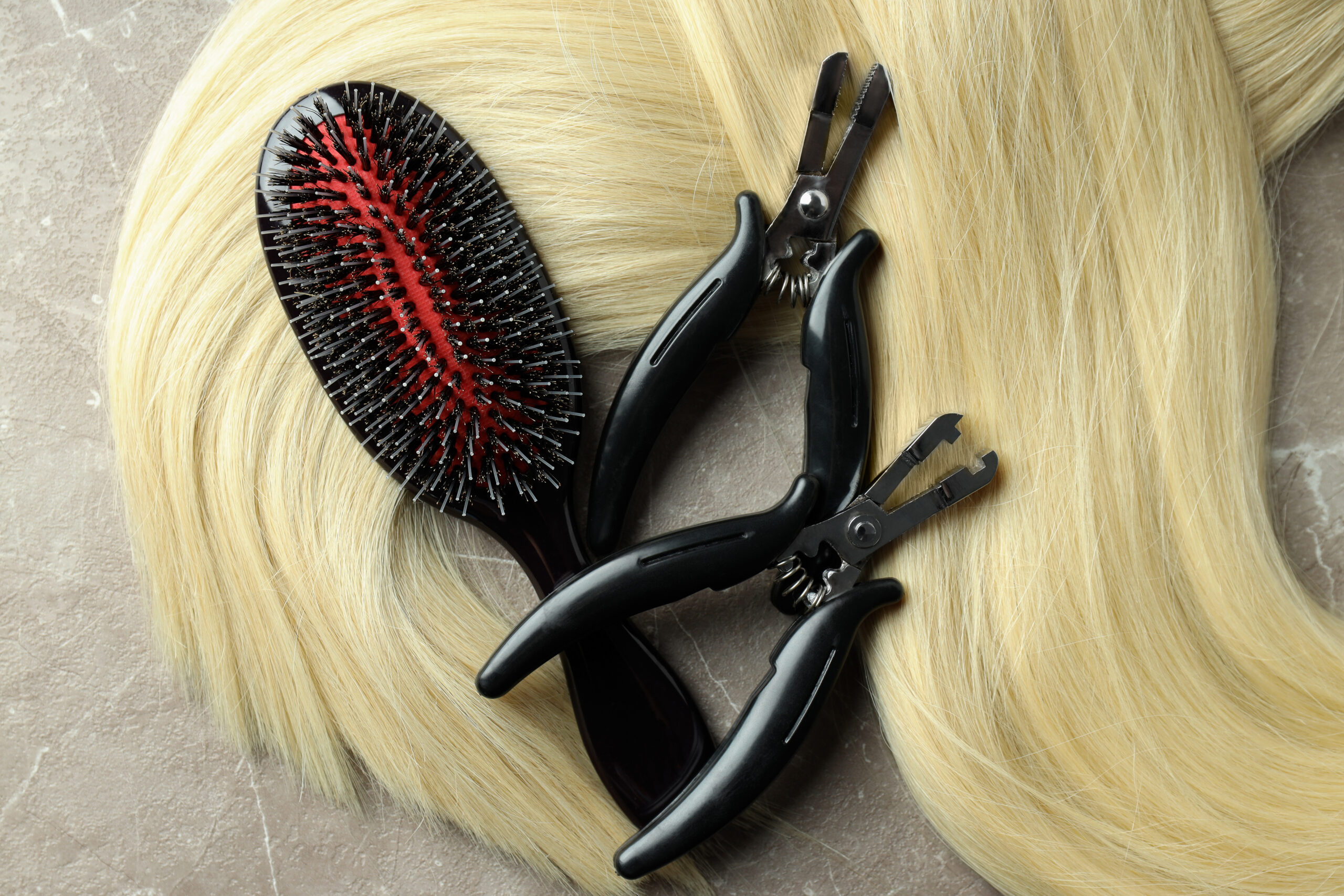 hair extension accessories on gray textured