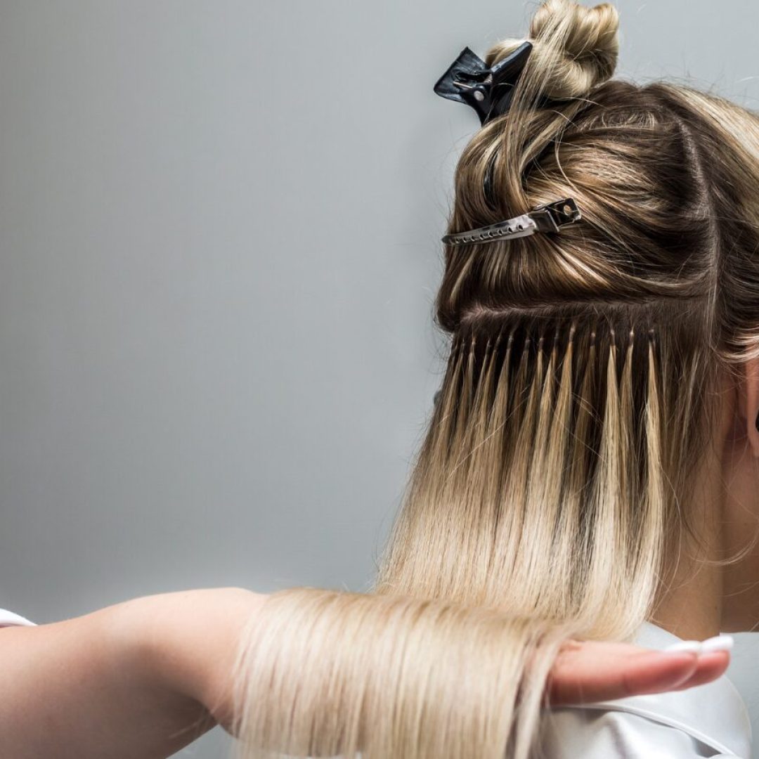 Blonde hair extension application with clips